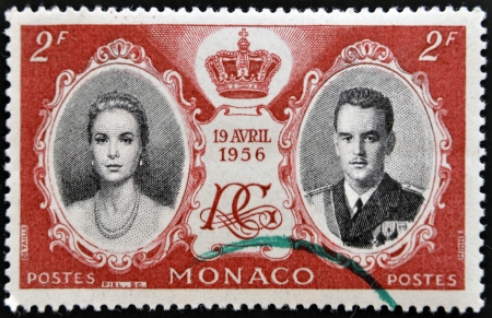MONACO - CIRCA 1956: stamp printed in Monaco, shows Princess Grace and Prince Rainier III, circa 1956 のeditorial素材