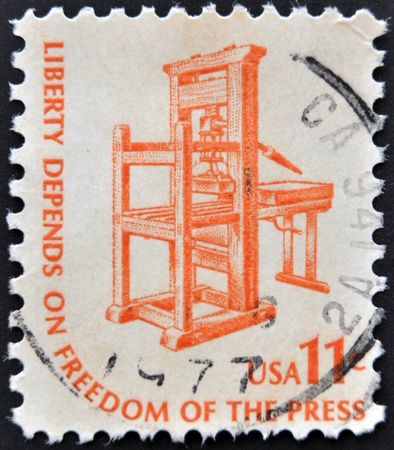 UNITED STATES OF AMERICA - CIRCA 1975  a stamp printed in USA shows Early American Printing Press, circa 1975 のeditorial素材