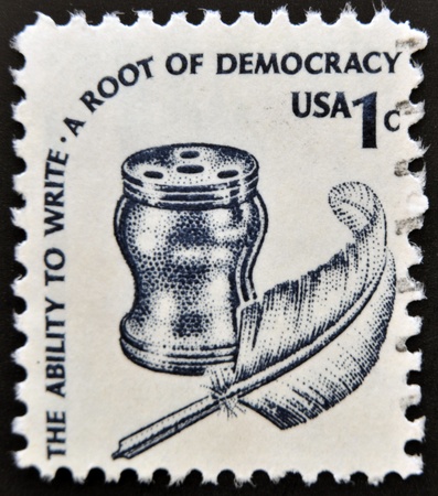 UNITED STATES OF AMERICA - CIRCA 1977  A stamp printed in USA  The ability to write - A root of democracy , circa 1977 のeditorial素材