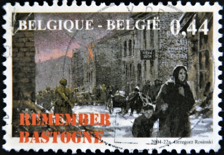 BELGIUM - CIRCA 2004  A stamp printed in Belgium shows the siege of the city of Bastogne in World War II in 1944, circa 2004 のeditorial素材