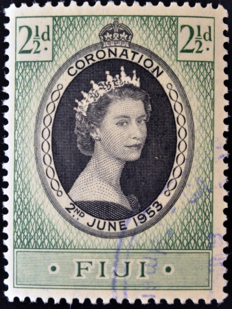 FIJI - CIRCA 1953  A stamp printed in Fiji shows queen Elisabeth II in commemoration of her coronation the two on June 1953  circa 1953の写真素材