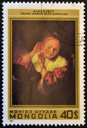 MONGOLIA - CIRCA 1981: stamp printed in Mongolia shows Young Woman with Earrings by Rembrandt, circa 1981 のeditorial素材
