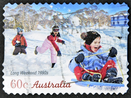 AUSTRALIA - CIRCA 2010: A stamp printed in australia shows long weekend 1990s, circa 2010の写真素材