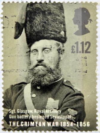 UNITED KINGDOM - CIRCA 2004: a stamp printed in Great Britain shows a portrait of Sergeant Glasgow who participated in the Crimean War, circa 2004のeditorial素材