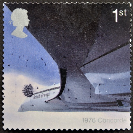 UK - CIRCA 2002: A stamp printed in Great Britain dedicated to 50th Anniversary of Passenger Jet Aviation, Airliners, shows Concorde (1976), circa 2002のeditorial素材