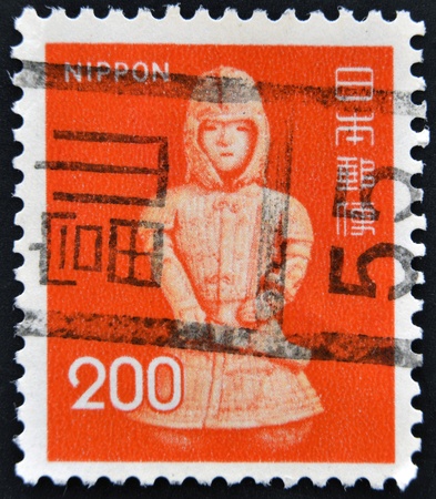 JAPAN - CIRCA 1980: A stamp printed in Japan shows image of Netsuke are miniature sculptures, circa 1980 のeditorial素材