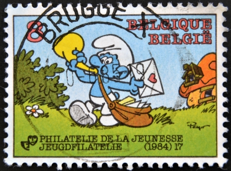 BELGIUM - CIRCA 1984: A stamp printed in Belgium dedicated to the Smurfs, circa 1984のeditorial素材