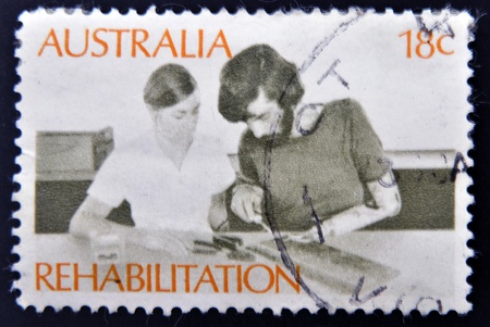 AUSTRALIA - CIRCA 1972: a stamp printed in Australia shows Amputee Assembling Electrical Circuit, Rehabilitation of the Handicapped, circa 1972 のeditorial素材