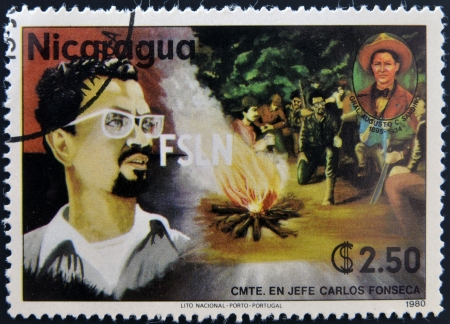 NICARAGUA - CIRCA 1980: A stamp printed in Nicaragua shows Carlos Fonseca, founder of the Sandinista National Liberation Front, circa 1980のeditorial素材