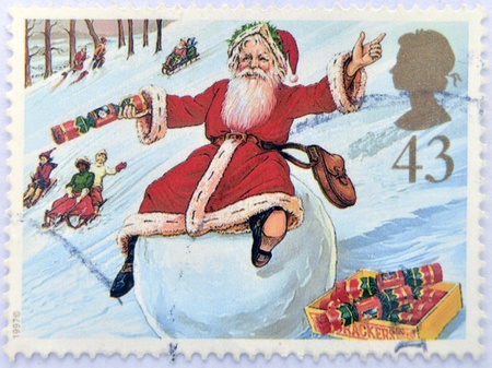 UNITED KINGDOM - CIRCA 1997: A stamp printed in Great Britain shows Father Christmas on Snowball, circa 1997 の写真素材