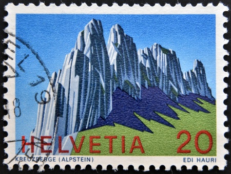 SWITZERLAND - CIRCA 1978: A stamp printed in Switzerland shows kreuzberge (Alpstein), Swiss Alps, circa 1978の写真素材