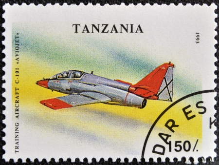 TANZANIA - CIRCA 1993: A stamp printed in Tanzania shows training aircraft C-101 "Aviojet", circa 1993の写真素材
