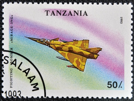 TANZANIA - CIRCA 1993: A stamp printed in Tanzania shows fighting bomber "Mirage 3NG", circa 1993の写真素材