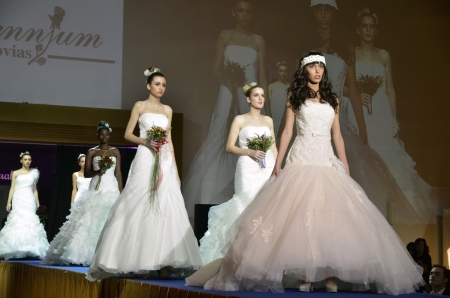 GRANADA, SPAIN - NOVEMBER 17: models with wedding dress walks the catwalk at the First Bridal Fair Granada, on November 17, 2012 in Granada, Spainのeditorial素材