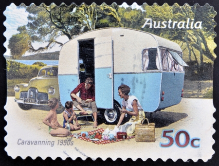 AUSTRALIA - CIRCA 2007: A stamp printed in australia shows Family enjoying a caravan of the 50s, caravanning 1950s, circa 2007 の写真素材
