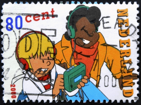 HOLLAND - CIRCA 2000: A stamp printed in Netherlands shows Sjors & Sjimmie, circa 2000 のeditorial素材