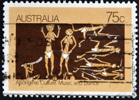 AUSTRALIA - CIRCA 1982: A stamp from Australia shows image celebrating the music and dance of Aboriginal culture, circa 1982 の写真素材
