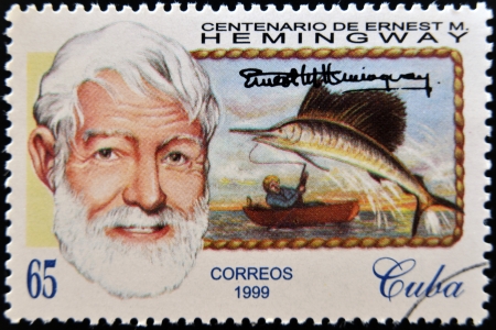 CUBA - CIRCA 1999: A stamp printed in Cuba shows Ernest Hemingway, circa 1993のeditorial素材