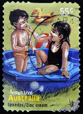 AUSTRALIA - CIRCA 2009 : a stamp printed in Australia shows australian inventions speedos - zinc cream, circa 2009 のeditorial素材