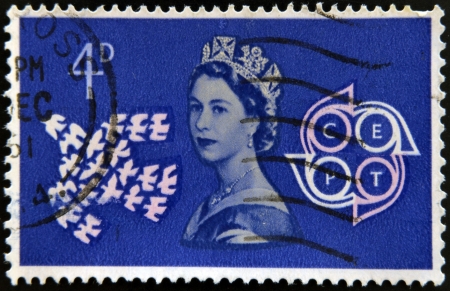 UNITED KINGDOM - CIRCA 1961: A stamp printed in Great Britain shows Queen Elizabeth II, doves and CEPT Emblem (Conference of European Postal Telecommunications), circa 1961 のeditorial素材