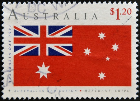 AUSTRALIA - CIRCA 1991: A stamp printed in Australia shows australian red ensign, merchant ships, circa 1991の写真素材