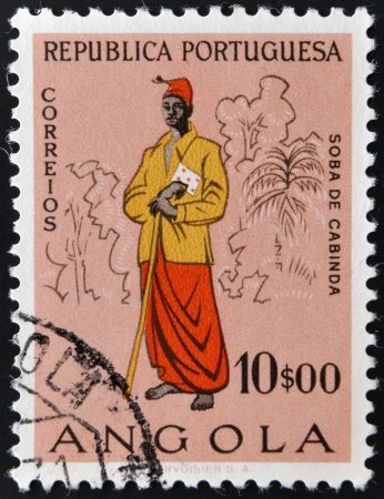 ANGOLA - CIRCA 1957  A stamp printed in Portugal dedicated to people of Angola, circa 1957の写真素材