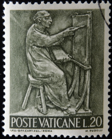 VATICAN - CIRCA 1966: A stamp printed in Vatican shows Bas reliefs of arts and crafts, painter, circa 1966 のeditorial素材