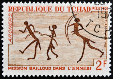 CHAD - CIRCA 1968: stamp printed in Chad shows Rock Painting, Archers, circa 1968 のeditorial素材