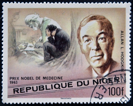 NIGER - CIRCA 1977: A stamp printed in Niger shows Nobel Prize in Medicine, Alan L. Hodgkin, circa 1977 のeditorial素材
