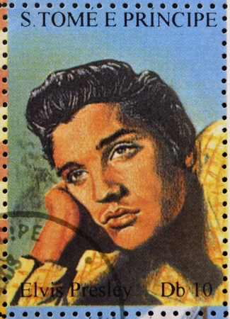 SAO TOME AND PRINCIPE - CIRCA 1995: A stamp printed in Sao Tome and Principe shows image portrait of famous American singer Elvis Presley (1935-1977), circa 1995. のeditorial素材