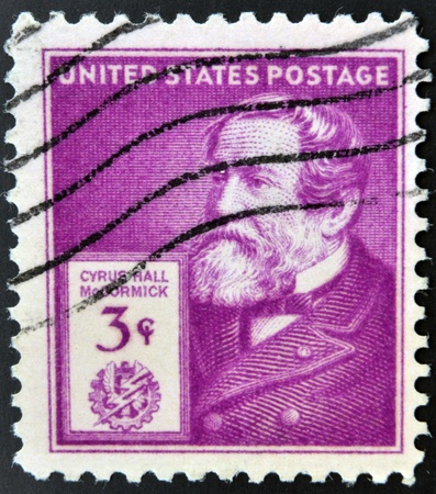 UNITED STATES OF AMERICA - CIRCA 1940: A stamp printed in USA shows Cyrus McCormick, circa 1940のeditorial素材