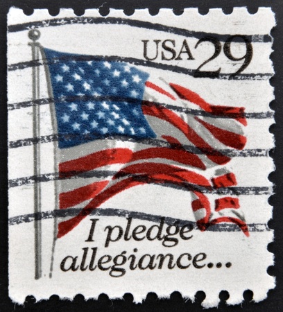 UNITED STATES OF AMERICA - CIRCA 1992: a stamp printed in the USA shows USA Flag, I Pledge of Allegiance, circa 1992 の写真素材