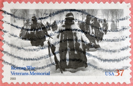 UNITED STATES OF AMERICA - CIRCA 2003  A stamp printed in USA shows American troops in Korea, circa 2003 の写真素材