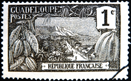 FRANCE - CIRCA 1917: A stamp printed in Guadeloupe shows Harbor at Basse-Terre, circa 1917 のeditorial素材