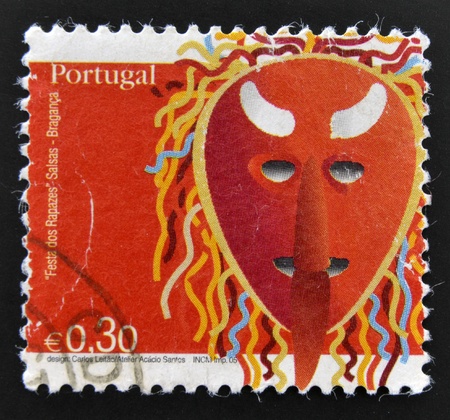 PORTUGAL - CIRCA 2005: A stamp printed in Portugal dedicated to Feast of Boys in Braganzaのeditorial素材