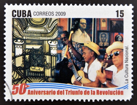 CUBA - CIRCA 2009: A stamp printed in cuba dedicated to 50 anniversary of the triumph of the revolution, shows national culture, circa 2009 のeditorial素材
