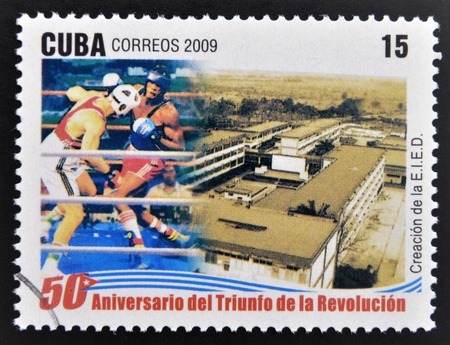 CUBA - CIRCA 2009: A stamp printed in cuba dedicated to 50 anniversary of the triumph of the revolution, shows creation of school sport, circa 2009 のeditorial素材