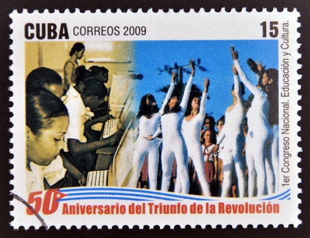 CUBA - CIRCA 2009: A stamp printed in cuba dedicated to 50 anniversary of the triumph of the revolution, shows First National Congress of Education and Culture, circa 2009 のeditorial素材