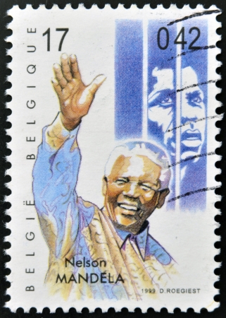 BELGIUM - CIRCA 1999: A stamp printed in Belgium showing an image of Nelson Mandela, circa 1999. のeditorial素材