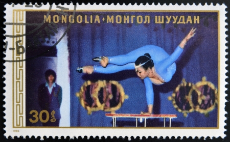 MONGOLIA - CIRCA 1986: A stamp printed in Mongolia shows Acrobat, circa 1986 のeditorial素材