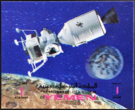 YEMEN - CIRCA 1980: A stamp printed in Yemen shows satellite in space, circa 1980のeditorial素材