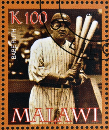 MALAWI - CIRCA 2007: A stamp printed in Malawi dedicated to greatest baseball players, shows Babe Ruth, circa 2007 のeditorial素材