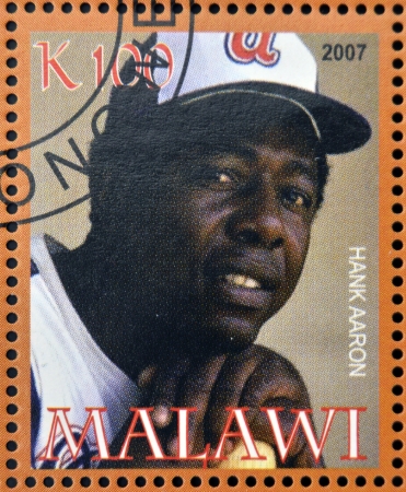 MALAWI - CIRCA 2007: A stamp printed in Malawi dedicated to greatest baseball players, shows Hank Aaron, circa 2007 のeditorial素材