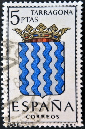 SPAIN - CIRCA 1965: A stamp printed in Spain dedicated to Arms of Provincial Capitals shows Tarragona, circa 1965. のeditorial素材