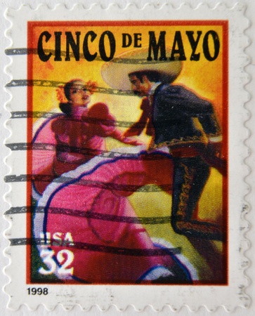 UNITED STATES OF AMERICA - CIRCA 1998: A stamp printed in USA shows salute to the holiday Cinco de Mayo, circa 1998 のeditorial素材