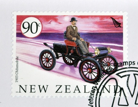 NEW ZEALAND - CIRCA 2003: A stamp printed in New Zealand dedicated to old cars, shows 1903 Oldsmobile, circa 2003 のeditorial素材