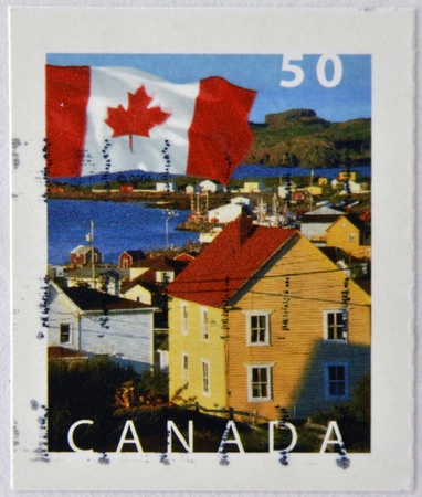 CANADA - CIRCA 2004: A stamp printed in Canada shows  Flag and Durell, Newfoundland, circa 2004のeditorial素材