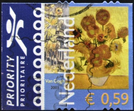 HOLLAND - CIRCA 2003: A stamp printed in Netherlands shows Vase with Twelve Sunflowers by Vincent Van Gogh, circa 2003 のeditorial素材