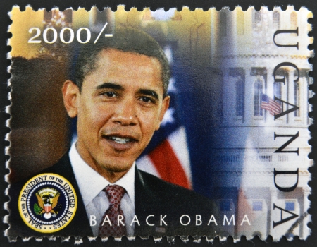 UGANDA - CIRCA 2000: A stamp printed in Uganda shows Barack Hussein Obama, circa 2009 のeditorial素材