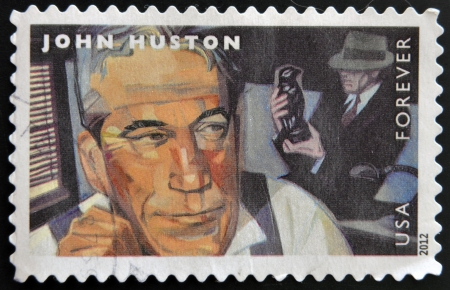 UNITED STATES OF AMERICA - CIRCA 2012: A stamp printed in USA dedicated to the Great Film Directors First-Class Forever, shows John Huston, circa 2012 のeditorial素材